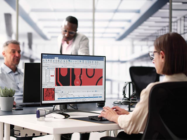 An engineer working on DFMStream software.