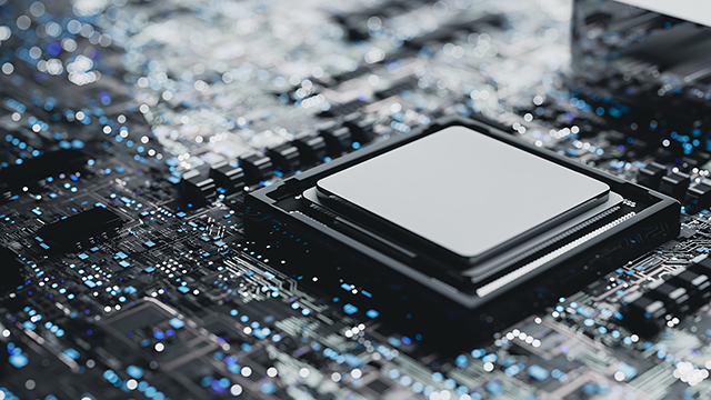 Close-up view of a microchip mounted on a circuit board.