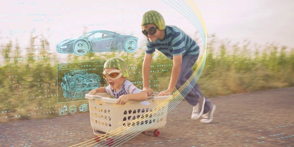 Two children playing in a cart