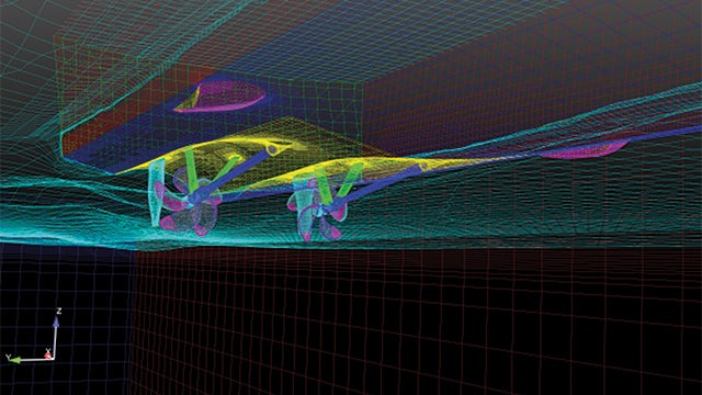 Figure 3: Computational mesh on the free surface and the vessel.