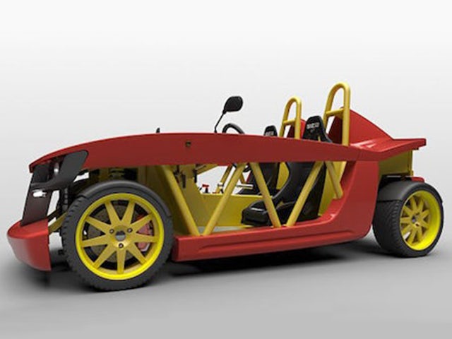 A 3D rendering of a car made in NX. It has yellow rims on the wheels, a yellow frame allowing you to see the inside of the car, and black seats with a red exterior. 
