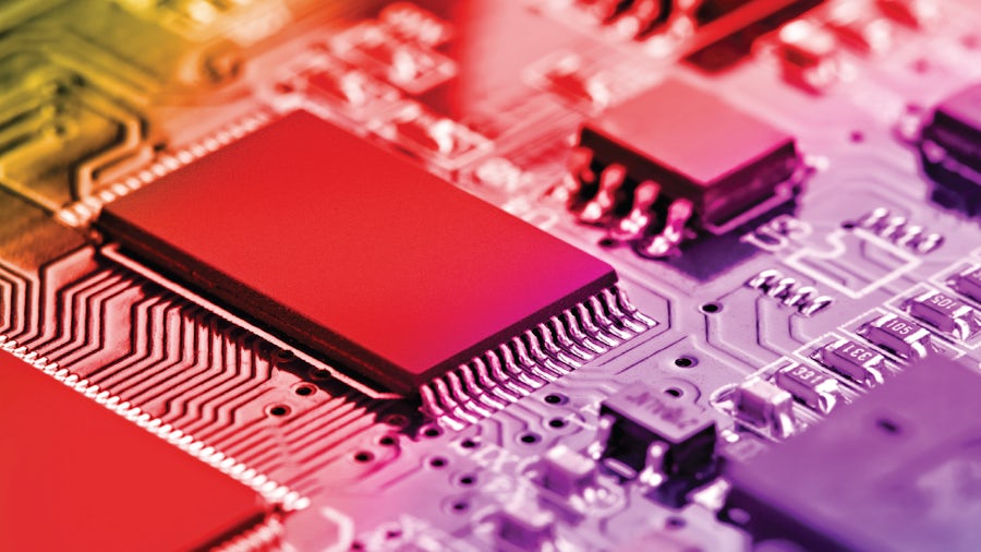 close up of a red and purple PCB