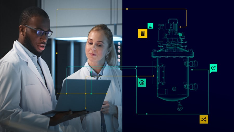 Two scientists in lab coats looking at a laptop next to an image of a digital twin of pharma equipment.