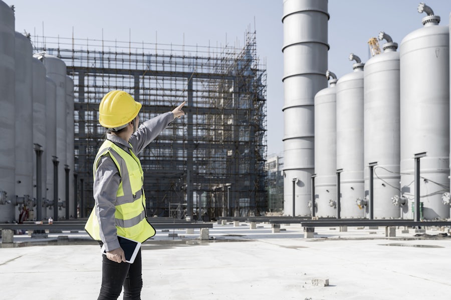 Engineer in front of capital asset