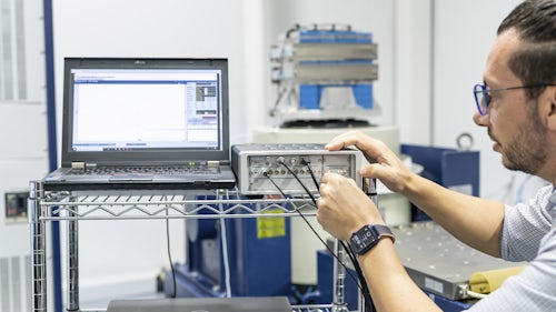 Engineering using Simcenter software on a laptop connected with SCADAS hardware device.