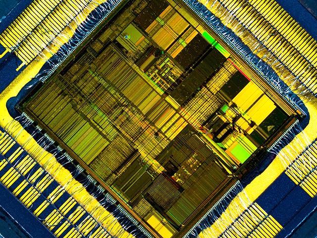 Close up look at an IC Chip that our IC Design, Verification & Manufacturing tools helped to create.