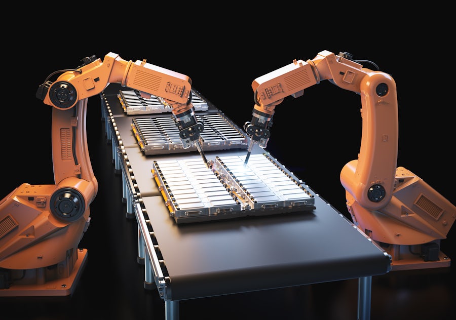Battery cells being assembled on a production line at a battery manufacturing plant.