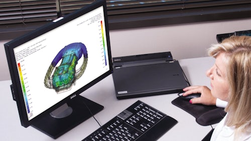 Engineer performing a thermal multiphysics simulation in Simcenter 3D on a computer.