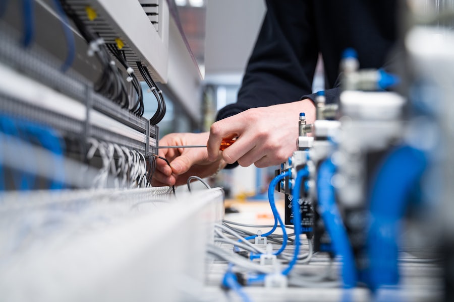person working on wiring
