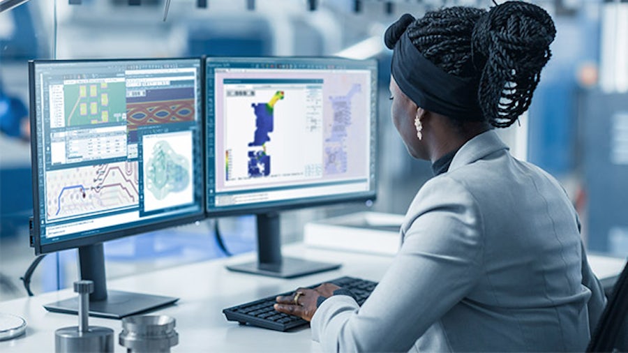 woman at computer working with HyperLynx pcb simulation software