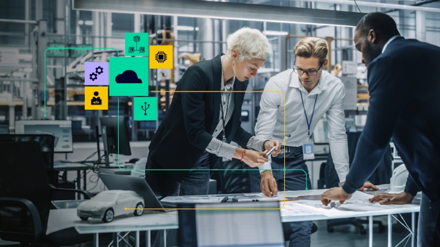 Three people standing at a table discussing information in the tabletop.