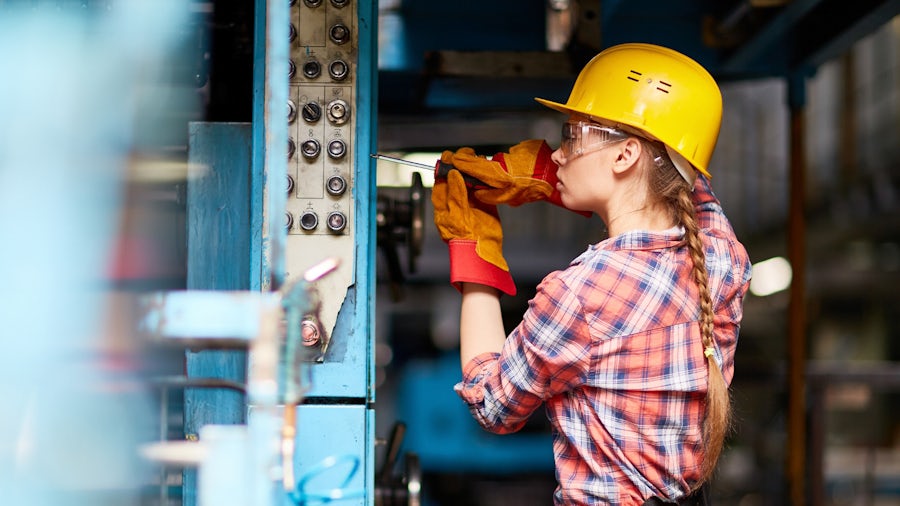 A technician works on the factory floor.