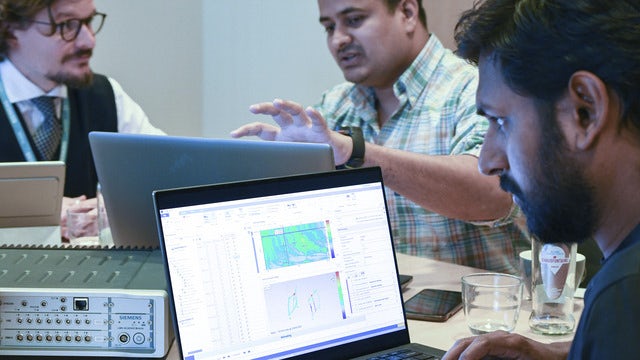 Engineers using Simcenter software.