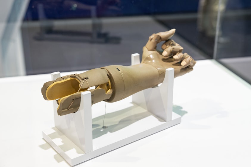 Unlimited Tomorrow display at the Siemens booth at CES 2024 as a close up of the prosthetic arm