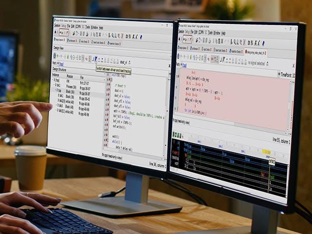 Two engineers are using Questa HL-SystemC on two monitors 