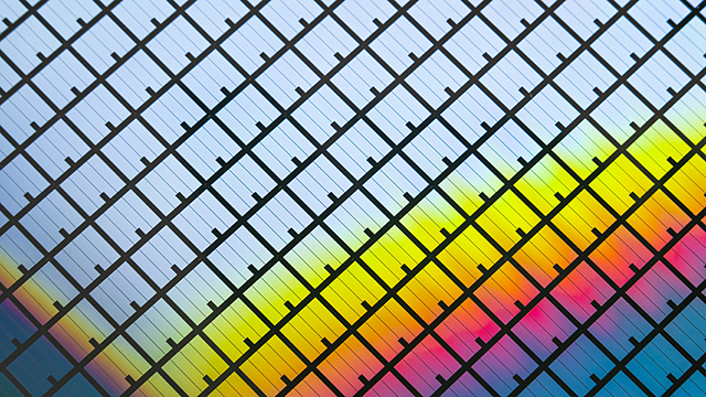 silicon wafer reflecting different colors.