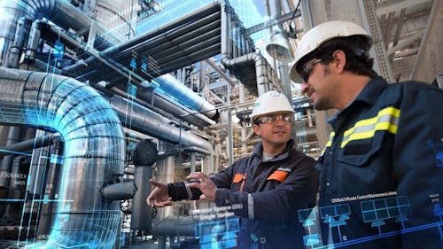 Digital twin in production line with two factory workers in safety equipment