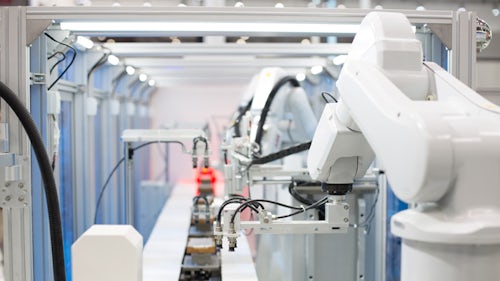 Pokročilá průmyslová robotika v moderní továrně