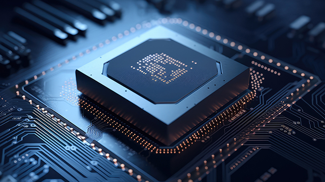 Close-up view of a computer chip mounted on a circuit board, illuminated with blue lighting. The chip features intricate connections and circuitry, highlighting its advanced technology.