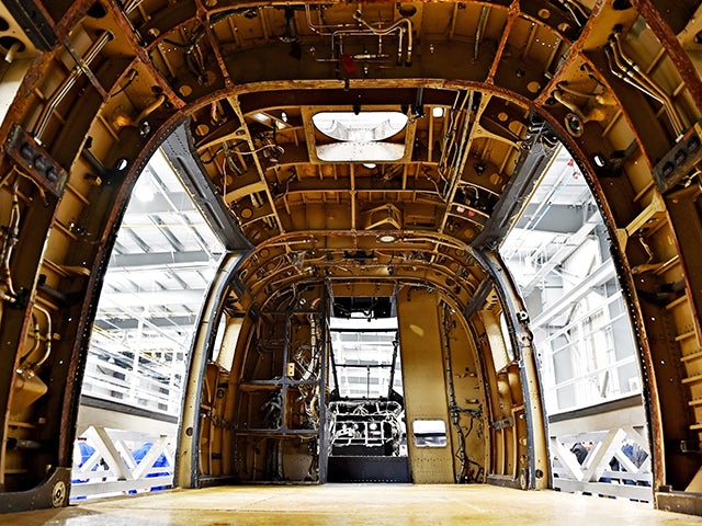 Inside body of airplane. 