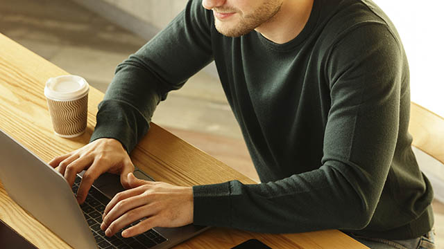 man on computer