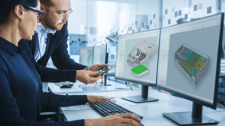 Two engineers collaborate on electric vehicle design using a shared engineering software platform.