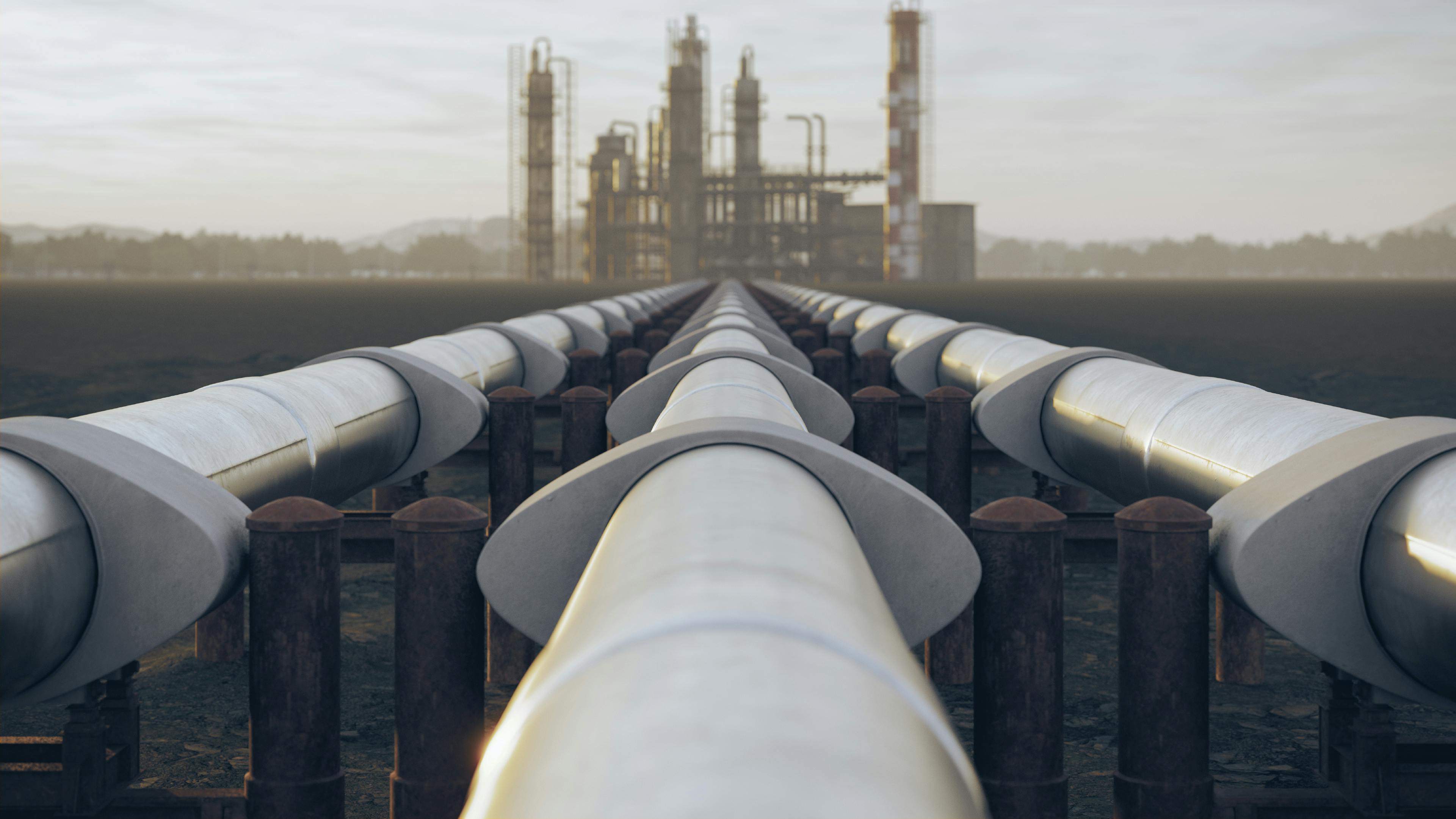 Oil and gas pipelines in front of a refinery.