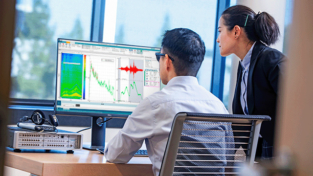 Two people are working on the Simulation process and data management (SPDM).