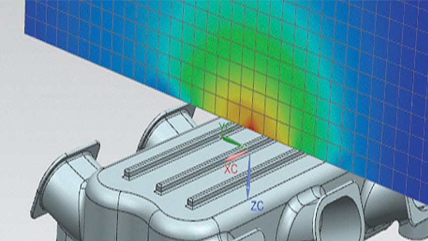Computergrafik einer vibroakustischen Simcenter-Analyse, vorgenommen an einer integrierten, gekoppelten Lösung.