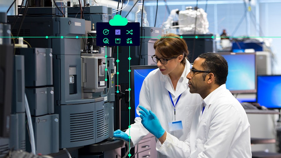 Two medical device professionals conducting quality and compliance.