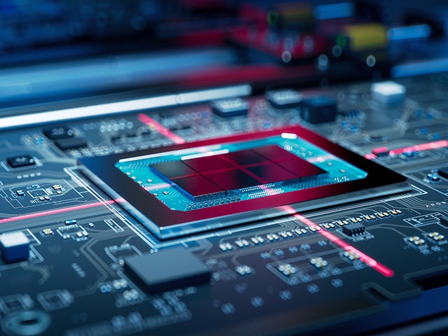 Printed circuit board with a red laser target on a conveyor in a fully automated PCB assembly line at an electronics manufacturing facility.