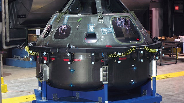 The composite crew module is shown during the assembly splice operation at ATK in Iuka, Mississippi, USA, prior to the installation of graphite epoxy doublers. The use of Fibersim helped NASA capitalize on the potential of composite materials by reducing risk, design and manufacturing costs as well as complexity and cycle times. The software has proven in production to increase engineering productivity and reduce development time, material waste, design revisions and tooling costs. 