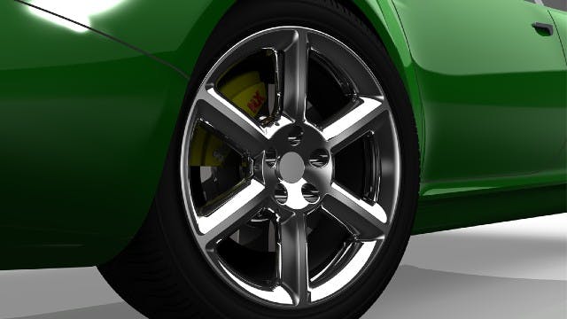 3d render of a car wheel showing the brake rotor and pad made in Siemens NX