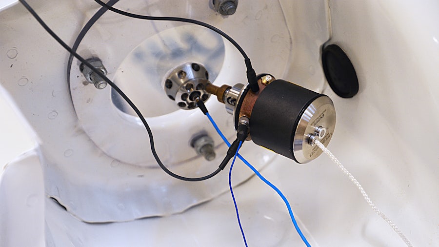 The Simcenter Qsources integral shaker in plane excitation adaptor.