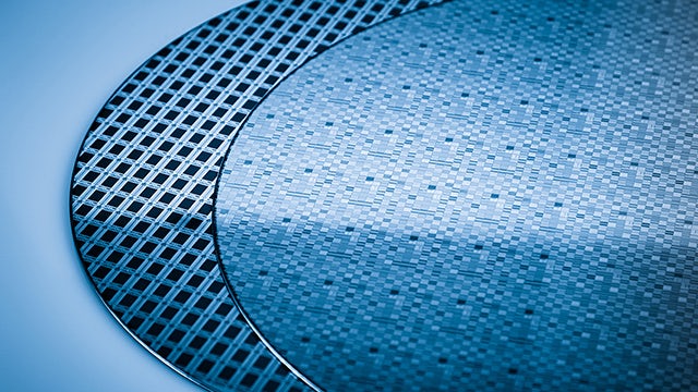 Picture of two silicon wafers in blue hue