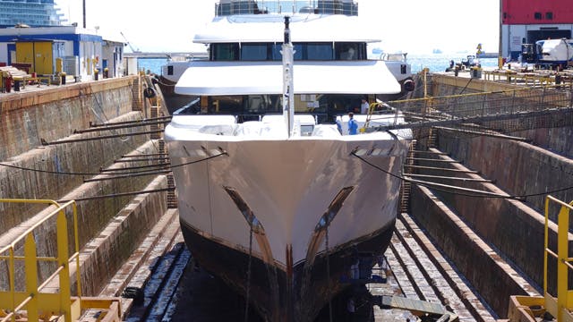 A large yacht docked.