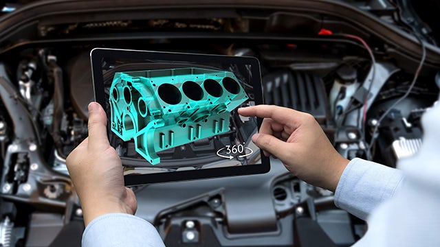 Digital twin mock up on a tablet screen of a motor. 