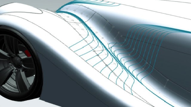 A car front end designed in NX with reflection lines added to check the surface quality.