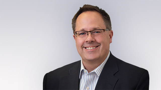 Headshot of John Miller