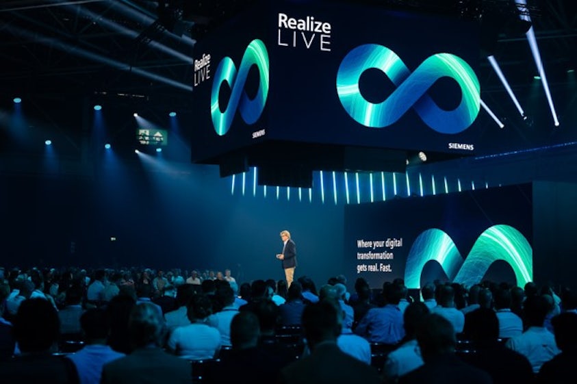 Man presenting during a breakout session at Realize LIVE.