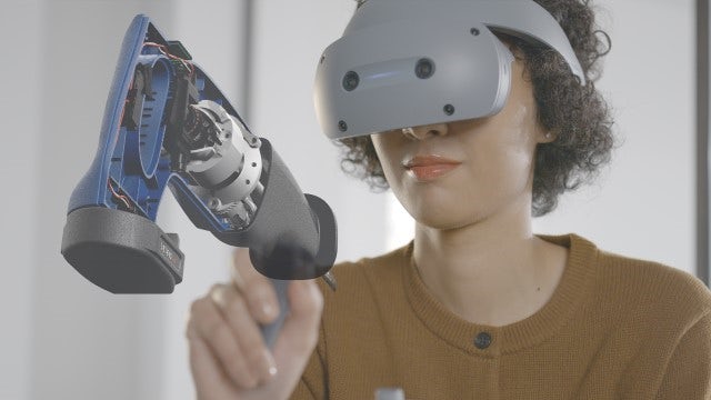 Woman wearing a headset that was presented at CES of the partnership with Sony and Siemens. 