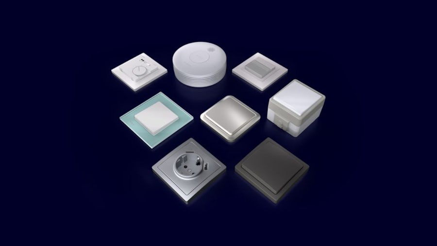 DELTA socket on a wall, with kitchen appliances in the background.