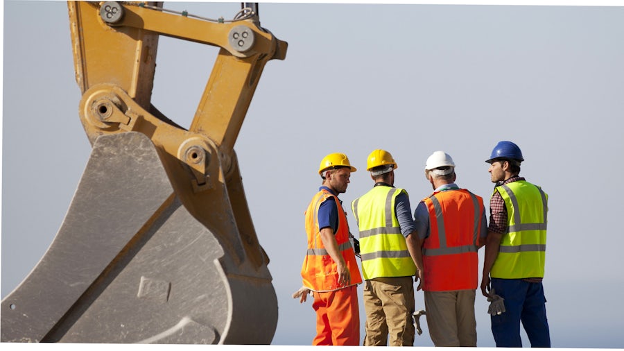 Heavy equipment engineers on a job site