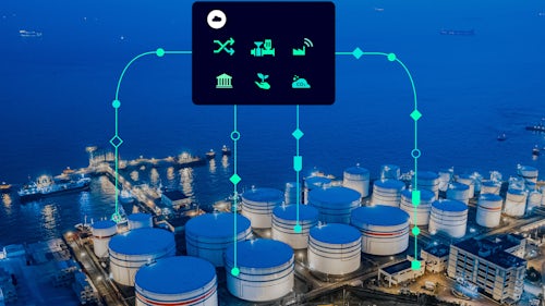 Oil and gas storage facility next to ocean with digital overlay.