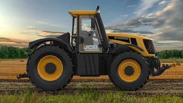 A photo-realistic rending of an NX CAD model of an electric tractor in a field.