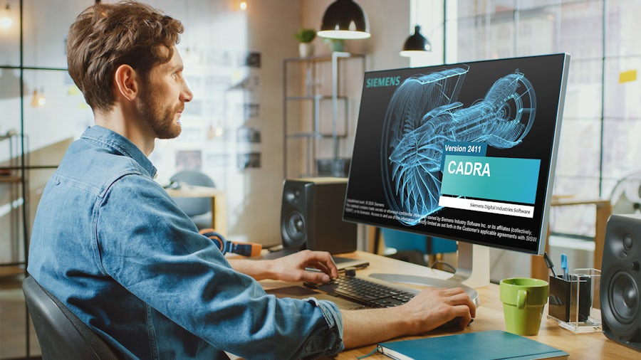 Man using CADRA 2411 drafting software