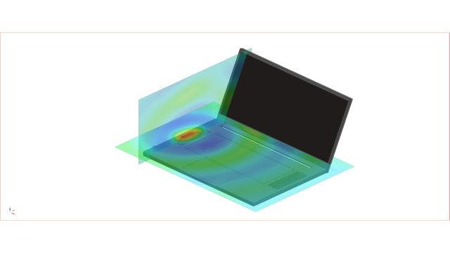 Picture of a laptop computer performing an acoustic simulation emitting waves of sound to access the acoustic performance 