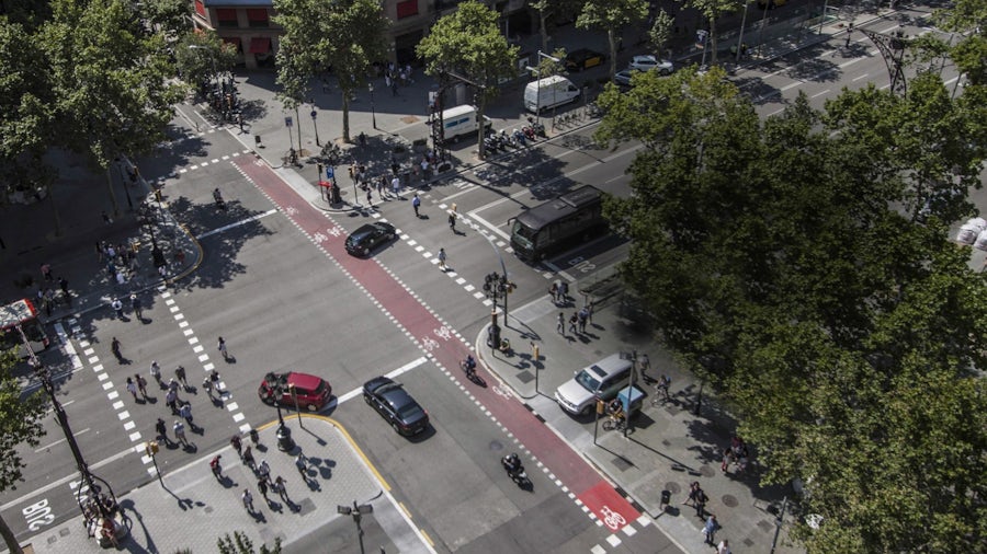 Overview shot of an intersection in a busy city.