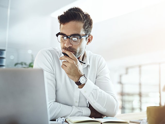 Man working on his laptop.
