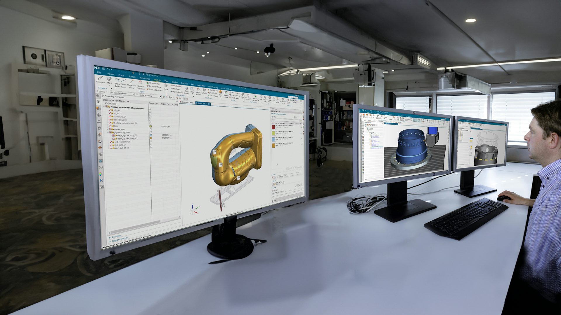 A man on a computer with NX CAM on the left screen and NX CAD on the right
